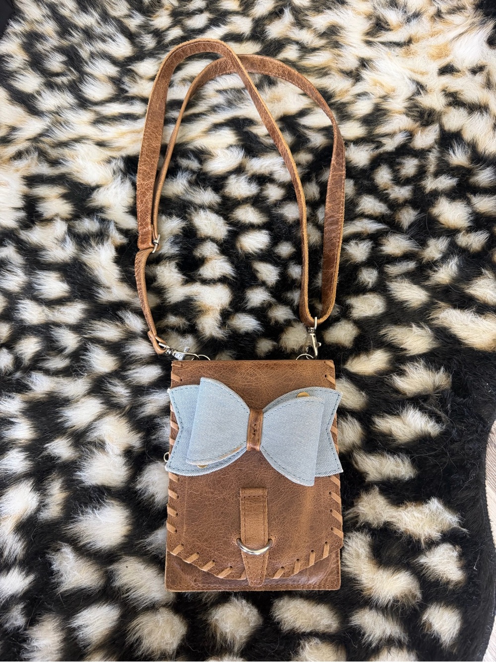 Brown Crossbody Bag with Light Blue Bow Accent